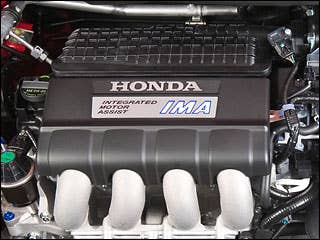 Under the skin, the CR-Z most closely resembles its sibling, the Honda Insight, from which is borrows its hybrid parts, including Honda’s Integrated Motor Assist system and a nickel-metal hydride battery pack. But the CR-Z employs a larger, 1.5-liter four-cylinder engine, which, once you add in the additional power provided by the electric motor, is rated at 122 horsepower and 128 lb-ft of torque. The other major difference from the Insight is that a close ratio, six-speed manual transmission is standard in the CR-Z, giving the car at least the pretense of sporting potential. (While a continuously variable transmission with steering wheel-mounted paddle “shifters” is available for an additional $650, it will cost you five lb-ft of torque as well.)Research the 2011 Honda CR-Z2011 Honda CR-Z Photos2011 Honda CR-Z Available Trims2011 Honda CR-Z Pricing & Quotes