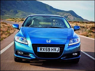 While our initial impressions of the CR-Z were positive, the longer and harder we drove it, the less we liked it. Just trundling along, the effect of pressing the sport button is an immediate rush of electric motor assist that certainly makes it seem like you’re behind the wheel of a performance machine. This boost is short-lived, however, as once the Integrated Motor Assist is providing its full torque output, you realize that the CR-Z can be woefully slow. Climbing hills or pulling out to pass requires downshifting a gear or two and really flogging the little four-cylinder. There is fun to be had in the CR-Z, but only in small doses.Research the 2011 Honda CR-Z2011 Honda CR-Z Photos2011 Honda CR-Z Available Trims2011 Honda CR-Z Pricing & Quotes