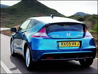 Now let’s put this commentary in its proper perspective: The CR-Z is plenty powerful enough for everyday driving, and compared to most inexpensive compact cars it’s actually got enough juice under the hood and delivers it in such a way to put a smile on your face. But hop out of this “sporty” hybrid and into a car with even a modicum of performance -- like, say, the base Hyundai Genesis Coupe -- and that grin will be elevated to uncontrollable laughter. Even compared to Honda’s other models, the performance of the CR-Z is questionable. Do some quick back-of-the-envelope math and you’ll find that the 2,637-pound CR-Z’s power-to-weight ratio trails both the Fit and the Civic coupe, both of which undercut the CR-Z by thousands of dollars.Research the 2011 Honda CR-Z2011 Honda CR-Z Photos2011 Honda CR-Z Available Trims2011 Honda CR-Z Pricing & Quotes