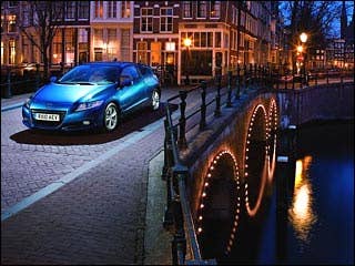 Honda is touting the 2011 CR-Z as the first vehicle to bridge the not-insubstantial gulf between a fuel-efficient hybrid and a fun-to-drive sports car. Imagine it as a crossbreed of an Insight with an S2000, and you’re thinking like Honda. But you’re also thinking crazy, as performance and parsimony remain diametrically opposed. No amount of quixotic engineering can overcome the limitations of physics, so the CR-Z remains a compromise, just like every other car. And in this case that means it’s a pretty good hybrid but not much of a sports car.Research the 2011 Honda CR-Z2011 Honda CR-Z Photos2011 Honda CR-Z Available Trims2011 Honda CR-Z Pricing & Quotes