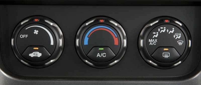 All but the cheapest and most basic cars on the market today come with air conditioning.  And we're thankful for that.  There was a time, though, that an option box needed to be checked to drive home in the comfort provided by air conditioning.  There may be a few super hardcore car buyers out there that don't want the added weight of an AC compressor underhood, but we'll gladly admit that we're not those people... anymore.
