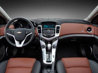 A new interior is really where GM should be focusing for its entry-level effort and thankfully, when it comes to the Cruze, they've delivered. Again, like the larger Malibu, the Cruze features a two-tone sculpted look with some bright plastics that give the look of aluminum (without the cost). The seats are supple and supportive -- something that was lacking from the Cobalt's interior.Read More Chevy CruzeIn Pictures: Chevy CruzeGM Invests in Ohio to Build New Compact CruzeTwenty Cars Of The Future
