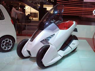 Honda may be best known for their reliable and amiable cars and trucks, but they also produce everything from ATVs to outboard engines, motorcycles to generators, from personal robots to private jets. That's why it wasn't too surprising to see the Japanese industrial giant unveil its odd 3R-C Concept. With two wheels up front and one in the back, the 3R-C is combines motorcycle and car in a uniquely Honda way.Read MoreDetroit Auto ShowLA Auto ShowPorsche 918 Hybrid ConceptHonda 3R-C Photos