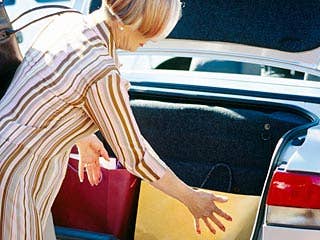 Get in the habit of putting shopping bags in the trunk right when you return to the vehicle, rather than after you park at the next place. According to National Insurance Crime Bureau (NICB) spokesman Frank Scafidi, thieves sometimes linger in busy parking lots looking for valuables being moved out of sight. Don't display to them what you have. Research Car SafetyCar Safety Hub