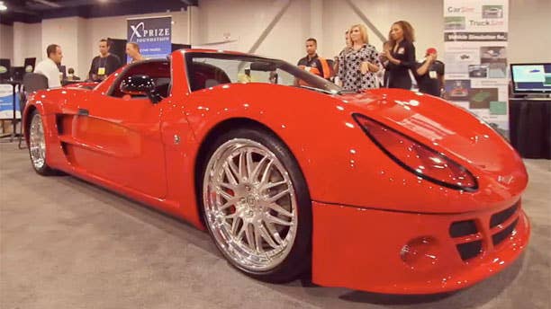 Li-ion's Inizio electric sports car is not an X-Prize contender which explains why it doesn't look like it was built in someone's backyard. Li-ion says it's going to mass produce the Inizio, which will have retail price around $139,000. The company says the car goes from 0-60 in less than four seconds. Inside there are leather-covered Recaro seats and what's supposed to be a serious audio system. Estimates in range and top speed seem to vary depending on what web site or magazine you read, but Li-ion Motors says the ultimate goal of the Inizio is to make a car that goes 200 mph and has a 200 mile range.