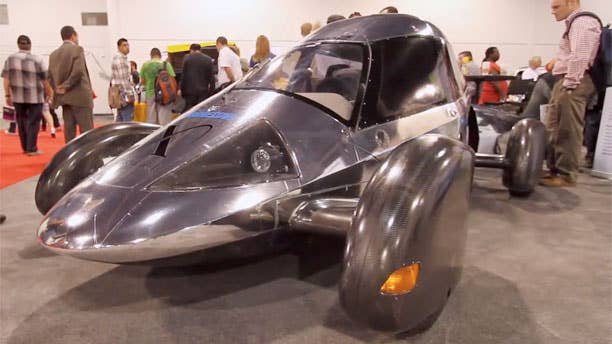Edison2's The Very Light Car is the only Automotive X-Prize winner to use an internal combustion engine. Still, they took home $5 million dollars in X-Prize money in the Mainstream vehicle class. That class requires four wheels and seating for four people. Using a turbocharged Yamaha 250-cc gasoline/E85 engine, the team achieved more than 200 mpg by using light weight materials to build a simple, no frills car. The Very Light Car has a top speed of 100 mph and a range of 600 miles from its 6.5 gallon tank.