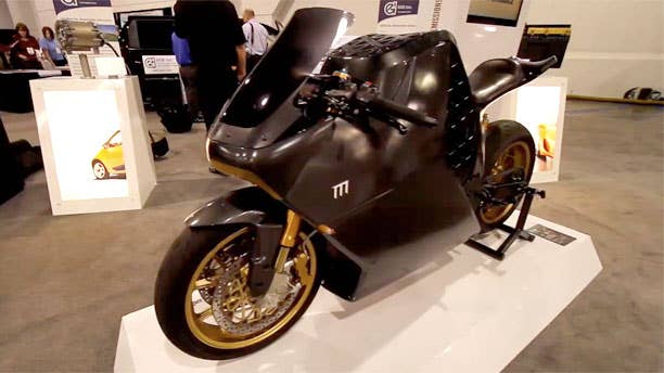 The Mission One PLE (PLE stands for Premium Limited Edition) electric  motorcycle is almost the perfect blending of advanced technology with  the expected SEMA speed tweaks. Built by Mission Motors in San  Francisco, the Mission One looks futuristic and delivers the performance  of today's sport bikes. Top Speed is 150 mph and the AC induction motor  delivers 120 lb-ft of torque. To make sure the PLE delivers stopping  power and handling on par with gasoline powered sport bikes, Mission  Motors gave it adjustable Ohlins suspension, Brembo brakes, and  Marchesini wheels. Mission One is also developing other electric vehicle  technologies such as drive systems, energy storage and software  integration.