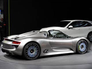 What's inside is even more interesting. The 918 Spyder is really a "super hybrid" -- pushed by both a 500-horsepower V8 and a pair of electric motors. The electric motors are attached at each axle, giving the car an additional 218 hp. Porsche says that means the concept can hit 60 mph in just over 3 seconds. That is incredibly fast, Porsche or not. The fact that it's a "hybrid"? Well, that's even better considering all the weight it's pulling around. Read More:Research New Porsche CarsHybrid CarsSports Cars