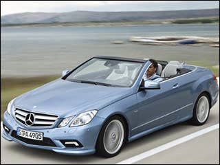 Price: Unknown, but likely to be $58,000 to start For its stylish new midsize ragtop, which arrives in showrooms this month, Mercedes chose to go with the classic fabric top, which means the vehicle will be lighter than the BMWs, Lexuses and Infinitis that have gone to retractable hardtops. Mercedes says the top can be opened or closed in about 20 seconds, even while the vehicle is in motion, at speeds of up to 25 mph. The E350 will be powered by a 268-hp, 3.5-liter V6, and the E550 will get power from a 382-hp, 5.5-liter V8. Both will be hitched to a seven-speed automatic tranny. The trunk of the E-Class convertible offers 17 cubic feet of luggage space when the top is up, and 13.8 when it’s down.Research the Mercedes-Benz E-Class2010 Mercedes-Benz E-Class Overview2010 Mercedes-Benz E-Class PicturesFree 2010 Mercedes-Benz E-Class Price Quote