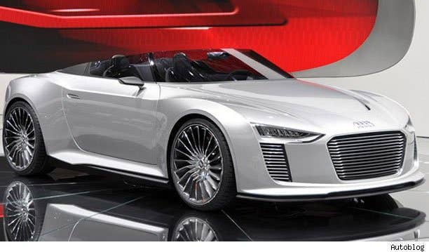 Audi e-tron Spyder Audi keeps on growing its e-tron family. The automaker pulled a fast one by unveiling yet another electrified monster at the 2010 Paris Motor Show, only this time, the low-slung hybrid came sans-top. The concept is powered by two electric motors and a 300-horsepower twin-turbo TDI V6 that comes to the fight with 479 pound-feet of torque.