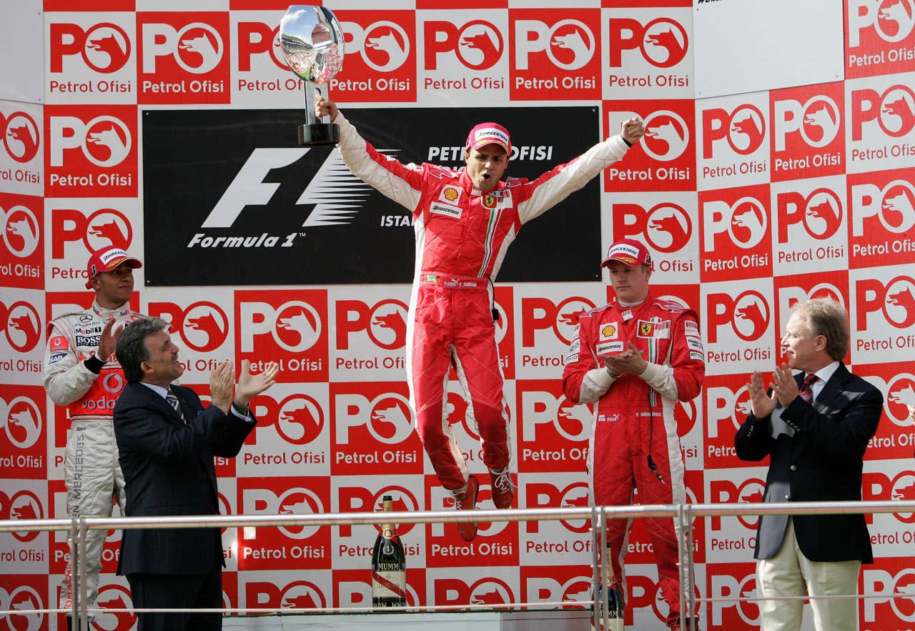 ISTANBUL, TURKEY - MAY 11: Felipe Massa of Brazil and Ferrari celebrates on the podium after winning the Turkish Formula One Grand Prix at Istanbul Park May 11, 2008, in Istanbul, Turkey. (Photo by Vladimir Rys/Bongarts/Getty Images)