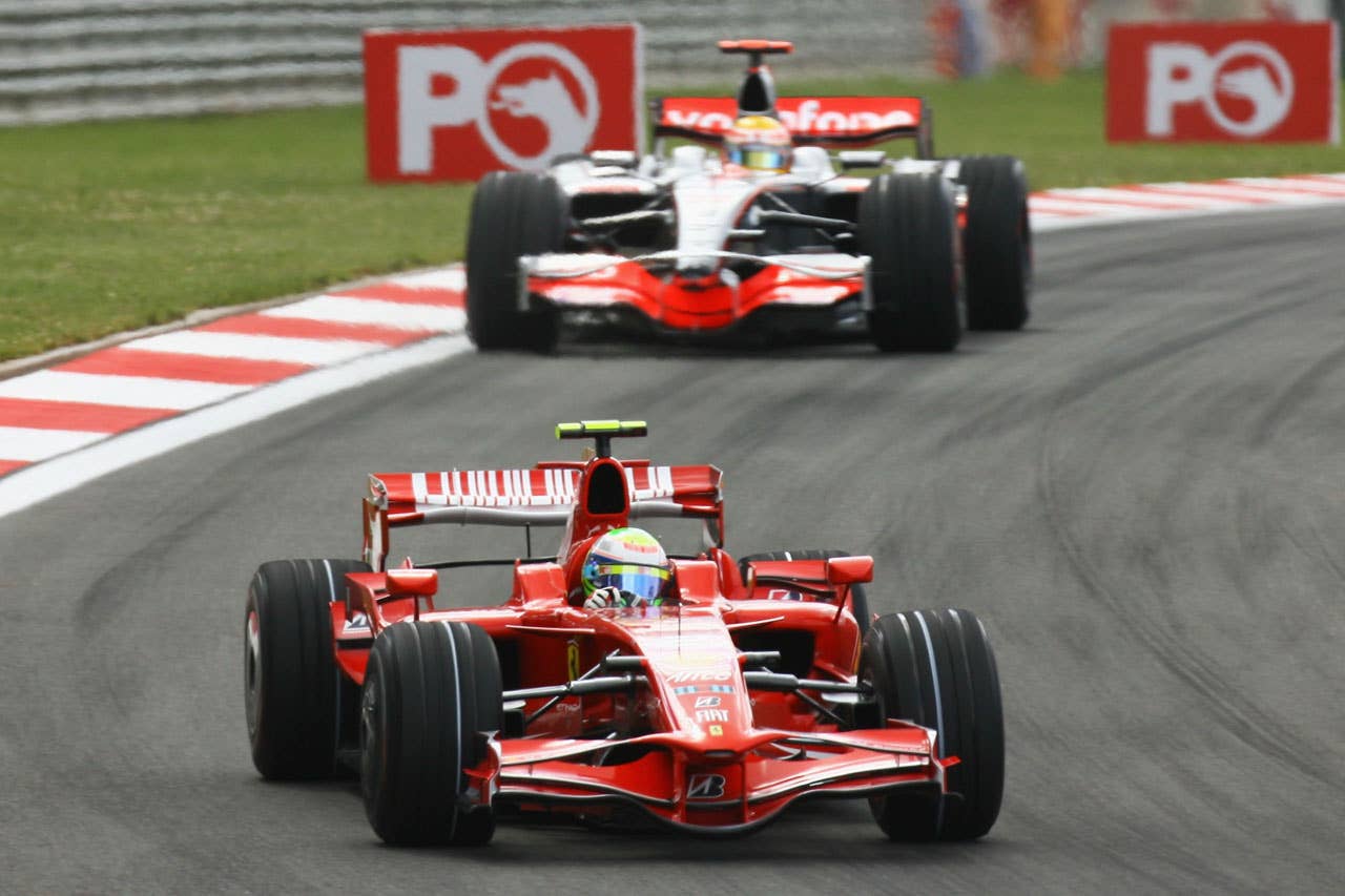 ISTANBUL, TURKEY - MAY 11: Felipe Massa of Brazil and Ferrari leads from Lewis Hamilton of Great Britain and McLaren Mercedes during the Turkish Formula One Grand Prix at Istanbul Park on May 11, 2008, in Istanbul, Turkey. (Photo by Mark Thompson/Getty Images)