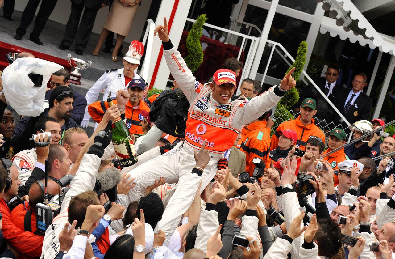 McLaren Mercedes' British driver Lewis Hamilton celebrates at the Monaco racetrack on May 25, 2008 in Monte Carlo, after winning the Monaco Formula One Grand Prix. McLaren Mercedes' British driver Lewis Hamilton won the race ahead of BMW Sauber's Polish driver Robert Kubica and Ferrari Brazilian's driver Felipe Massa. AFP PHOTO / BERTRAND GUAY (Photo credit should read BERTRAND GUAY/AFP/Getty Images)