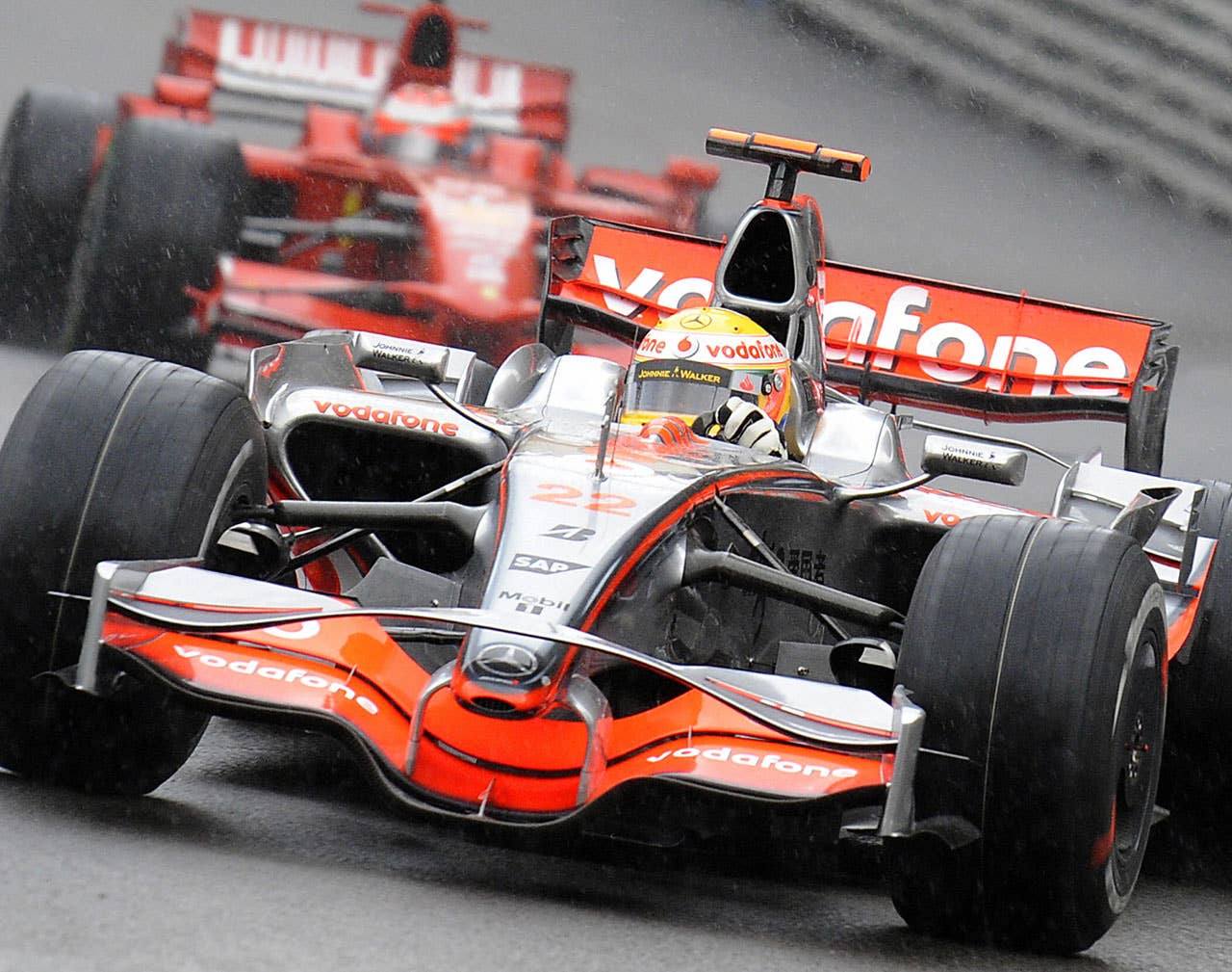 McLaren Mercedes' British driver Lewis Hamilton drives ahead of Ferrari's Finnish driver Kimi Raikkonen at the Monaco racetrack on May 25, 2008 in Monte Carlo, during the Monaco Formula One Grand Prix. AFP PHOTO / BERTRAND GUAY (Photo credit should read BERTRAND GUAY/AFP/Getty Images)