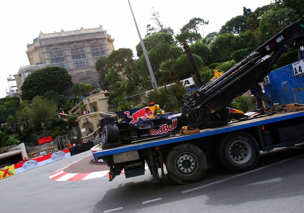 A crane lifts the car of Toro Rosso's French driver Sebastien Bourdais after he crashed at the Monaco racetrack on May 25, 2008 in Monte Carlo, during the Monaco Formula One Grand Prix. McLaren Mercedes' British driver Lewis Hamilton won the race ahead of BMW Sauber's Polish driver Robert Kubica and Ferrari Brazilian's driver Felipe Massa. AFP PHOTO / ERIC ESTRADE (Photo credit should read ERIC ESTRADE/AFP/Getty Images)