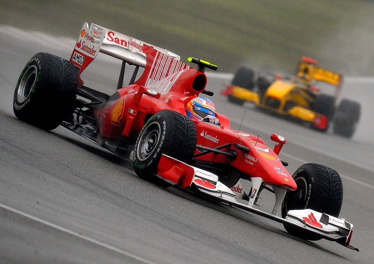 Ferrari driver Fernando Alonso of Spain drives his car during Formula One's Chinese Grand Prix in Shanghai on April 18, 2010. Alonso finished the race in fourth place.   AFP PHOTO/GOH CHAI HIN (Photo credit should read GOH CHAI HIN/AFP/Getty Images)