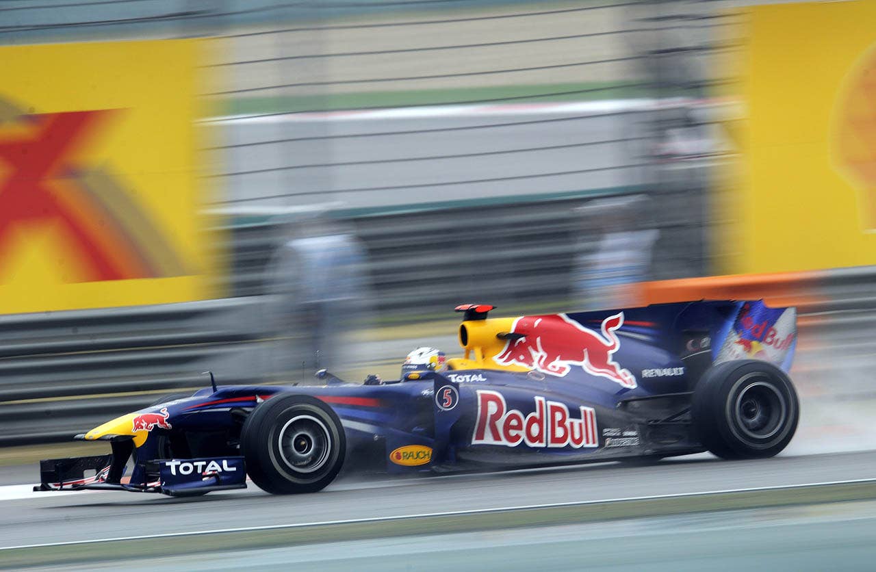 Red Bull-Renault driver Sebastian Vettel of Germany drives his car during Formula One's Chinese Grand Prix in Shanghai on April 18, 2010. Vettel finished the race in sixth place.  AFP PHOTO/Peter PARKS (Photo credit should read PETER PARKS/AFP/Getty Images)
