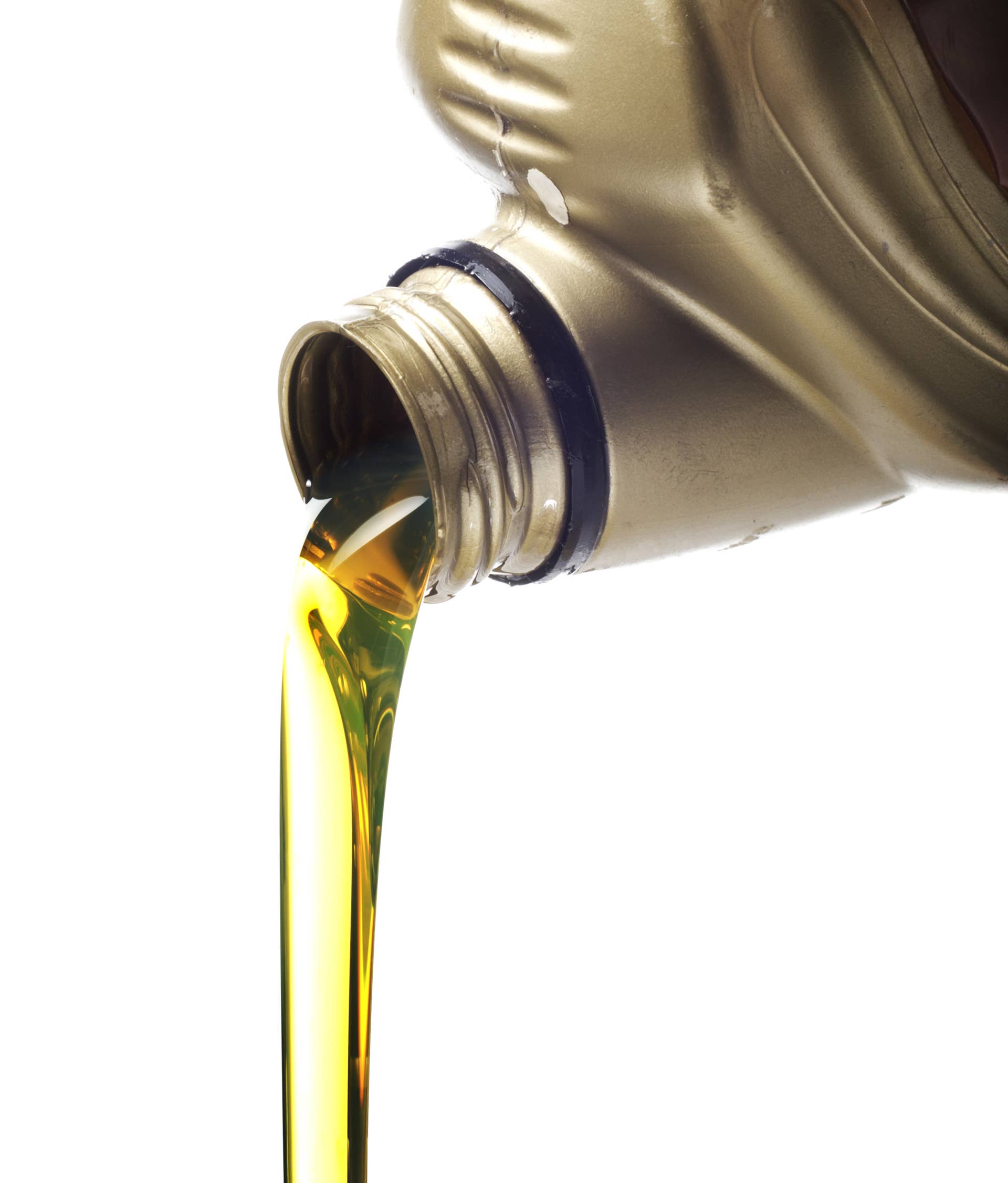 Motor oil poring over white background