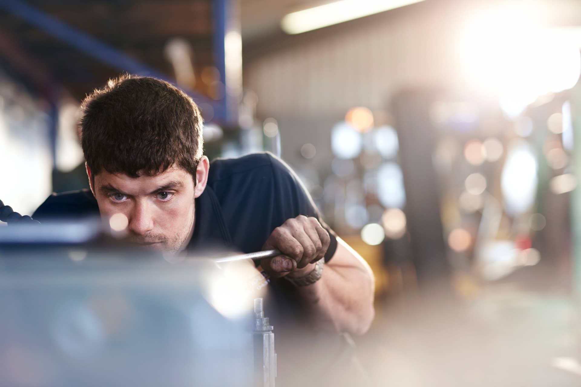 Mechanic working in auto repair shop