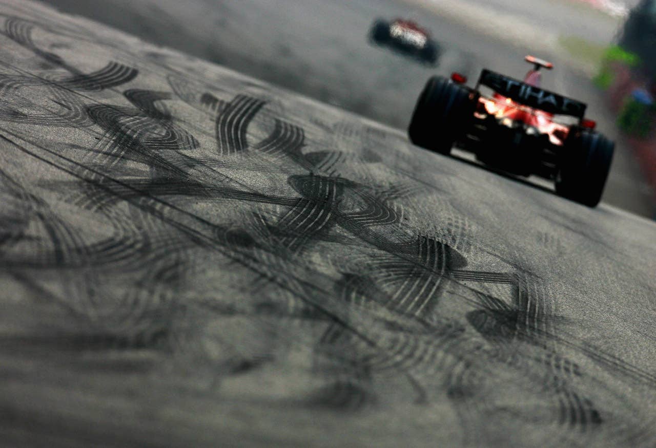 SHANGHAI, CHINA - OCTOBER 19: Kimi Raikkonen of Finland and Ferrari drives on his way to finishing third during the Chinese Formula One Grand Prix at the Shanghai International Circuit on October 19, 2008 in Shanghai, China. (Photo by Clive Mason/Getty Images)