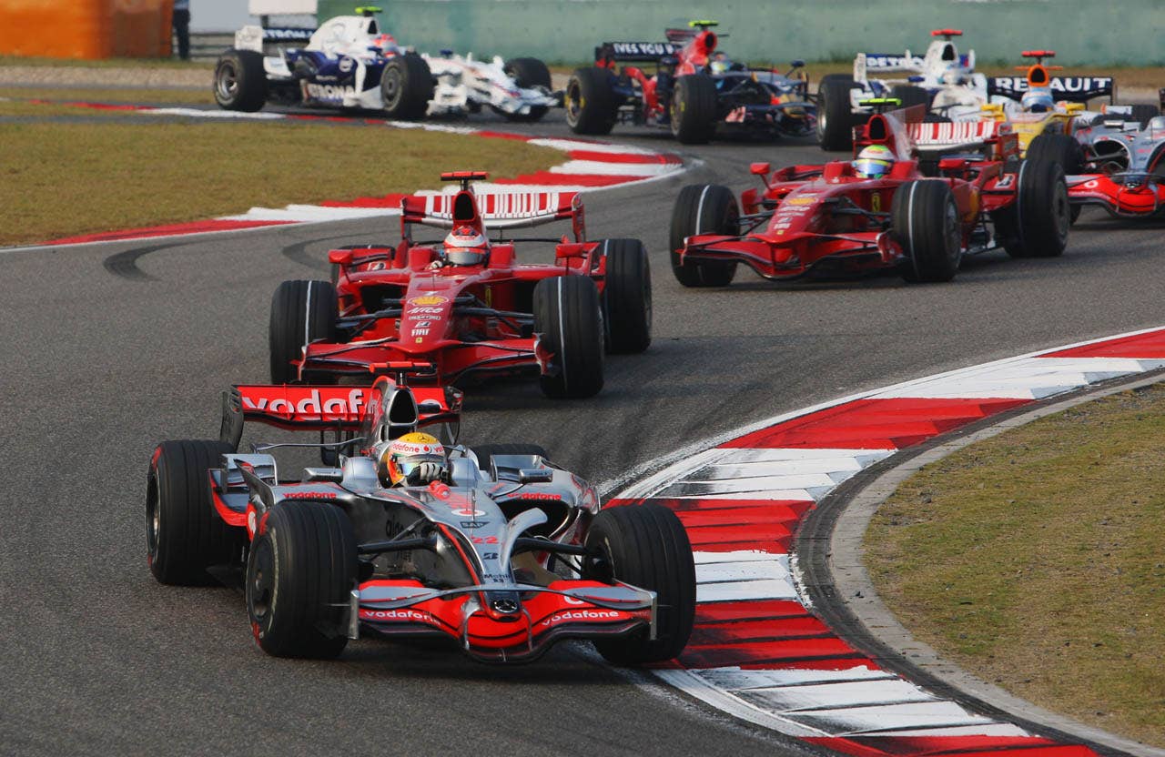 SHANGHAI, CHINA - OCTOBER 19: Lewis Hamilton of Great Britain and McLaren Mercedes leads from Kimi Raikkonen of Finland and Ferrari and Felipe Massa of Brazil and Ferrari at the start of the Chinese Formula One Grand Prix at the Shanghai International Circuit on October 19, 2008 in Shanghai, China. (Photo by Mark Thompson/Getty Images)
