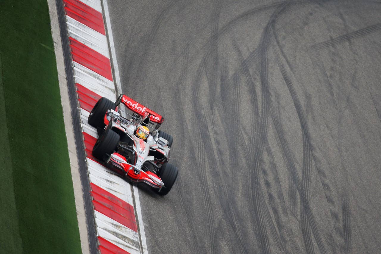 SHANGHAI, CHINA - OCTOBER 19: Lewis Hamilton of Great Britain and McLaren Mercedes drives on his way to winning the Chinese Formula One Grand Prix at the Shanghai International Circuit on October 19, 2008 in Shanghai, China. (Photo by Mark Thompson/Getty Images)