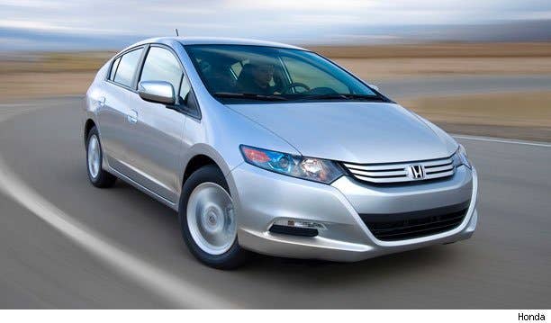 Engine-Mounted Mild Hybrid - The 1999 Honda Insight was actually the second modern hybrid to come to market after the Prius (although it did beat the Toyota to U.S. by about six months). Honda has since used its hybrid architecture one each of its successive hybrid models. It's so-called "Integrated Motor Assist" uses a lower power motor mounted directly on the output end of the engine's crankshaft. When energized, the motor applies torque directly to the crankshaft upstream of the clutch. In 2005, GM briefly offered a similar system in its full-size pickups and BMW and Mercedes-Benz have jointly developed a system of their own that went on sale in late 2009.  Because the motor is directly coupled to the engine and has lower output than a strong hybrid, these mild hybrids are unable to drive on electricity alone. Instead the motor provides extra boost and regenerative braking capability and also acts as the starter. While motor output is inadequate to drive the vehicle, it is sufficient to provide the torque needed to run the engine on an Atkinson cycle for improved efficiency. Since mild hybrids use less powerful motors, they consequently have smaller batteries as well.