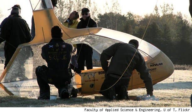 The team prepares the Snowbird for flight.