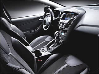 The new Focus gets a sporty, sculpted new interior. There will be several trim levels, including the range-topping Titanium edition (shown) that is already popular on several of Ford's European models. At first glance, you might not notice the groundbreaking technology. As on the current Focus, Ford's Sync technology (developed with Microsoft) is optional. The 2012 Focus offers Sync along with the all-new MyFord Touch system that provides special steering wheel controls and a multiple LCD screens designed into the car's interior. “This isn’t a new dashboard or a new instrument cluster or an interior redesign,” said Derrick Kuzak, group vice president, Global Product Development. “MyFord rethinks how information is presented to drivers and how drivers are able to personalize the way they relate to the information or entertainment the car makes available to them. It puts tremendous power at the hands of Focus owners.”Read MoreIn Pictures: 2012 Ford FocusIn Pictures: 2011 Chevy Cruze2010 Detroit Auto Show