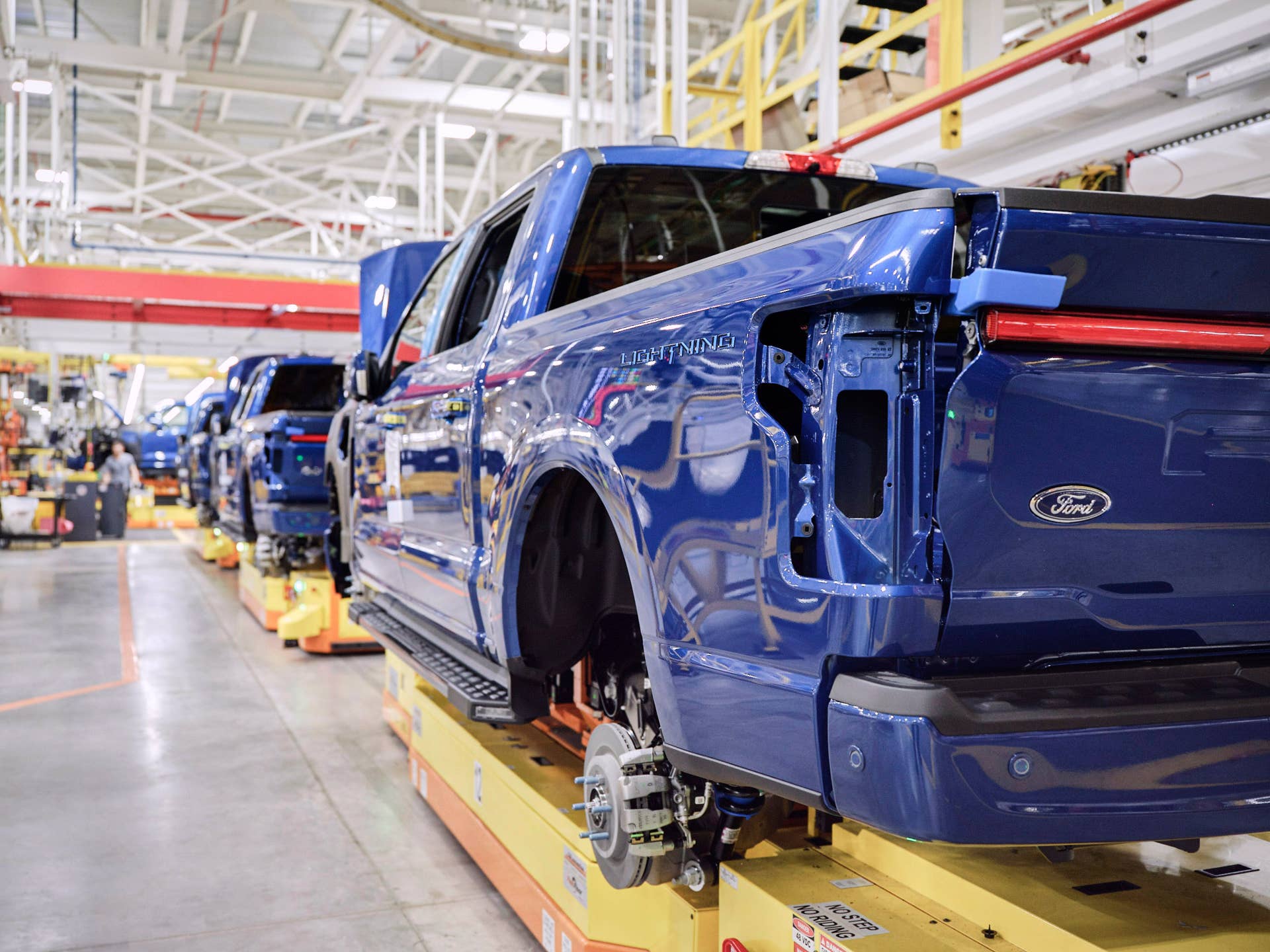 The manufacturing technology in the Rouge Electric Vehicle Center is just as innovative as the F-150 Lightning. It is the first Ford plant without traditional in-floor conveyor lines and instead uses robotic Autonomous Guided Vehicles to move F-150 Lightning trucks from workstation to station in the plant. Due to high demand, the current model year is no longer available for retail order. Contact your dealer for more information.