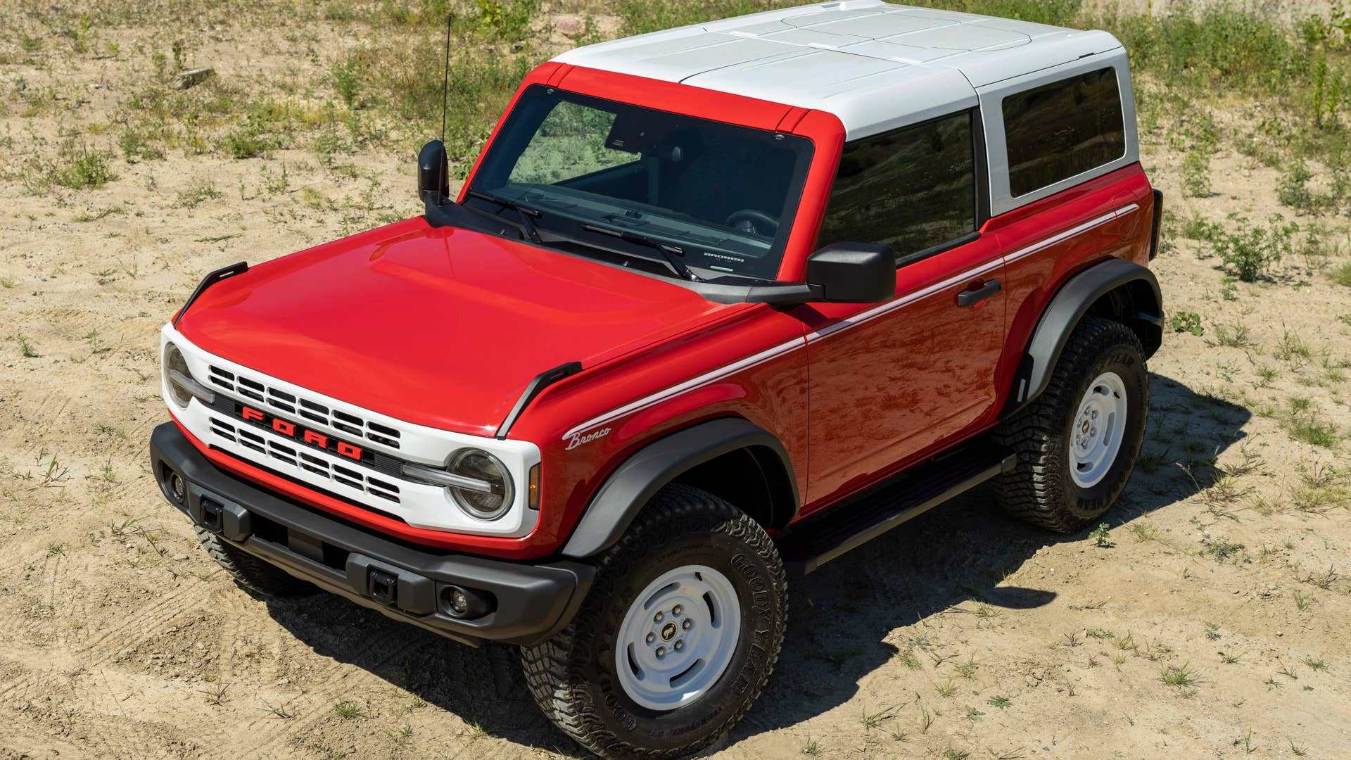 Bronco Heritage Edition available winter 2023. Limited availability. Preproduction models shown.  Always consult the Owner’s Manual before off-road driving, know your terrain and trail difficulty, and use appropriate safety gear.