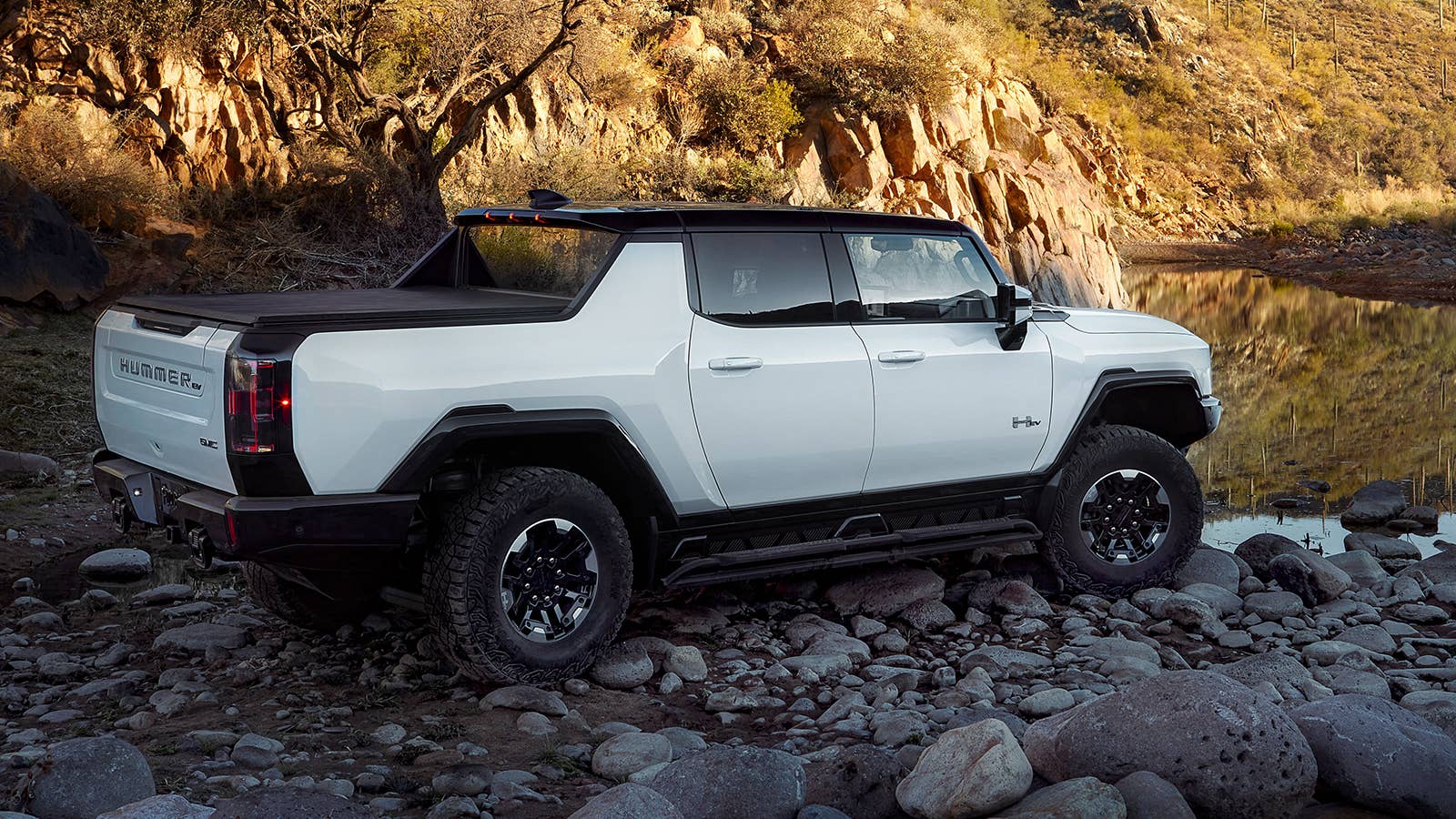Adaptive Air Suspension helps raise the 2022 GMC HUMMER EV Pickup to ford water or clear boulders when necessary.