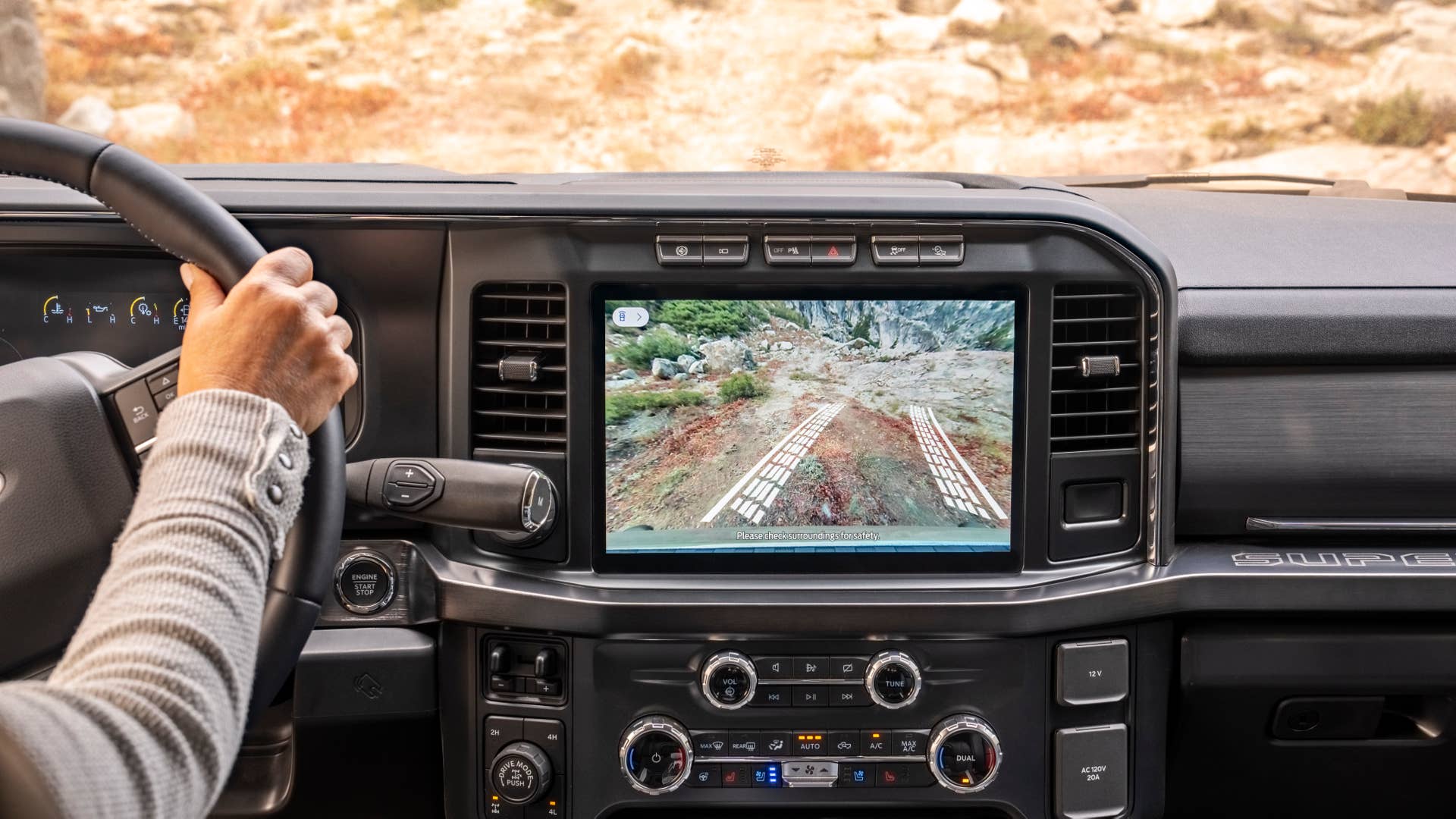 Always consult the Owner’s Manual before off-road driving, know your terrain and trail difficult, and use appropriate safety gear. Professorial driver on closed course. Available early 2023. Preproduction model shown with available features.