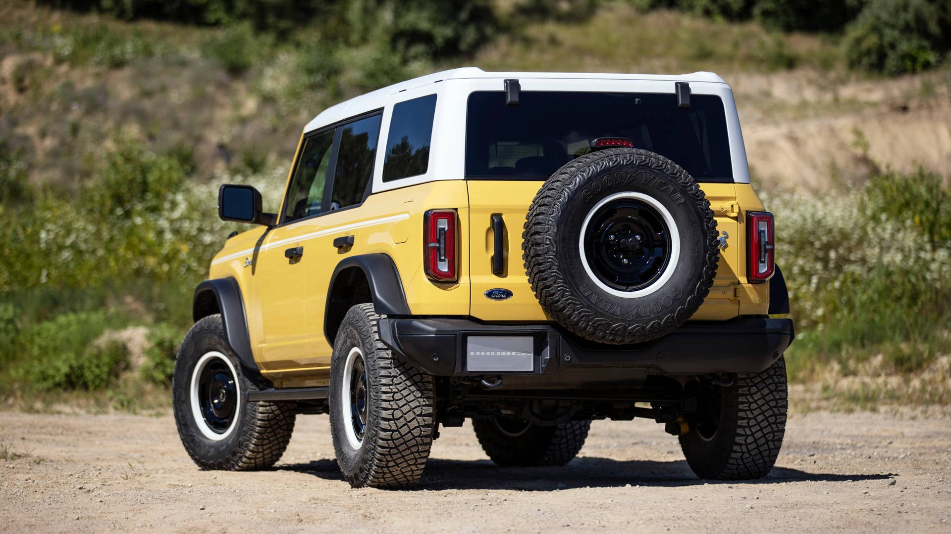 Bronco Heritage Limited Edition available winter 2023.  Limited availability. Preproduction models shown.  Always consult the Owner’s Manual before off-road driving, know your terrain and trail difficulty, and use appropriate safety gear.