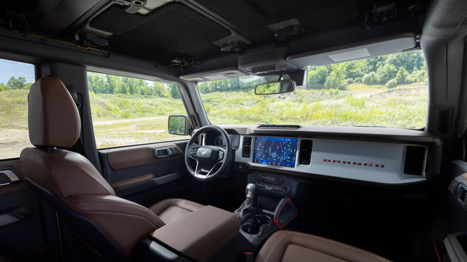 Bronco Heritage Limited Edition available winter 2023. Limited availability. Preproduction models shown. Always consult the Owner’s Manual before off-road driving, know your terrain and trail difficulty, and use appropriate safety gear.
