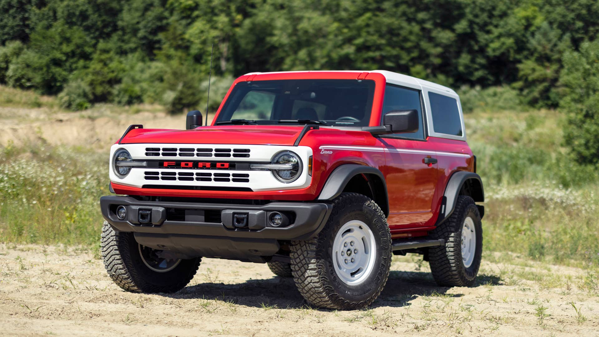 Bronco Heritage Edition available winter 2023. Limited availability. Preproduction models shown.  Always consult the Owner’s Manual before off-road driving, know your terrain and trail difficulty, and use appropriate safety gear.