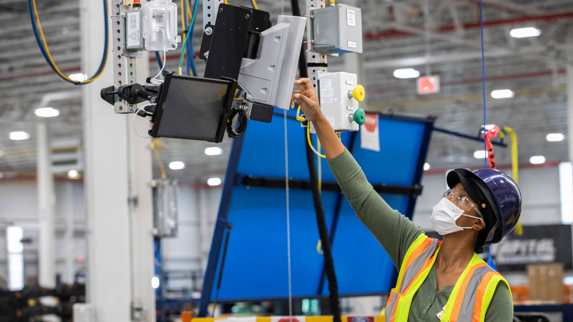 One year after Ford confirmed construction of the Rouge Electric Vehicle Center in Dearborn, Mich., the first Ford F-150 Lightning pre-production units begin leaving the factory. Pre-production model shown. F-150 Lightning available starting spring 2022.