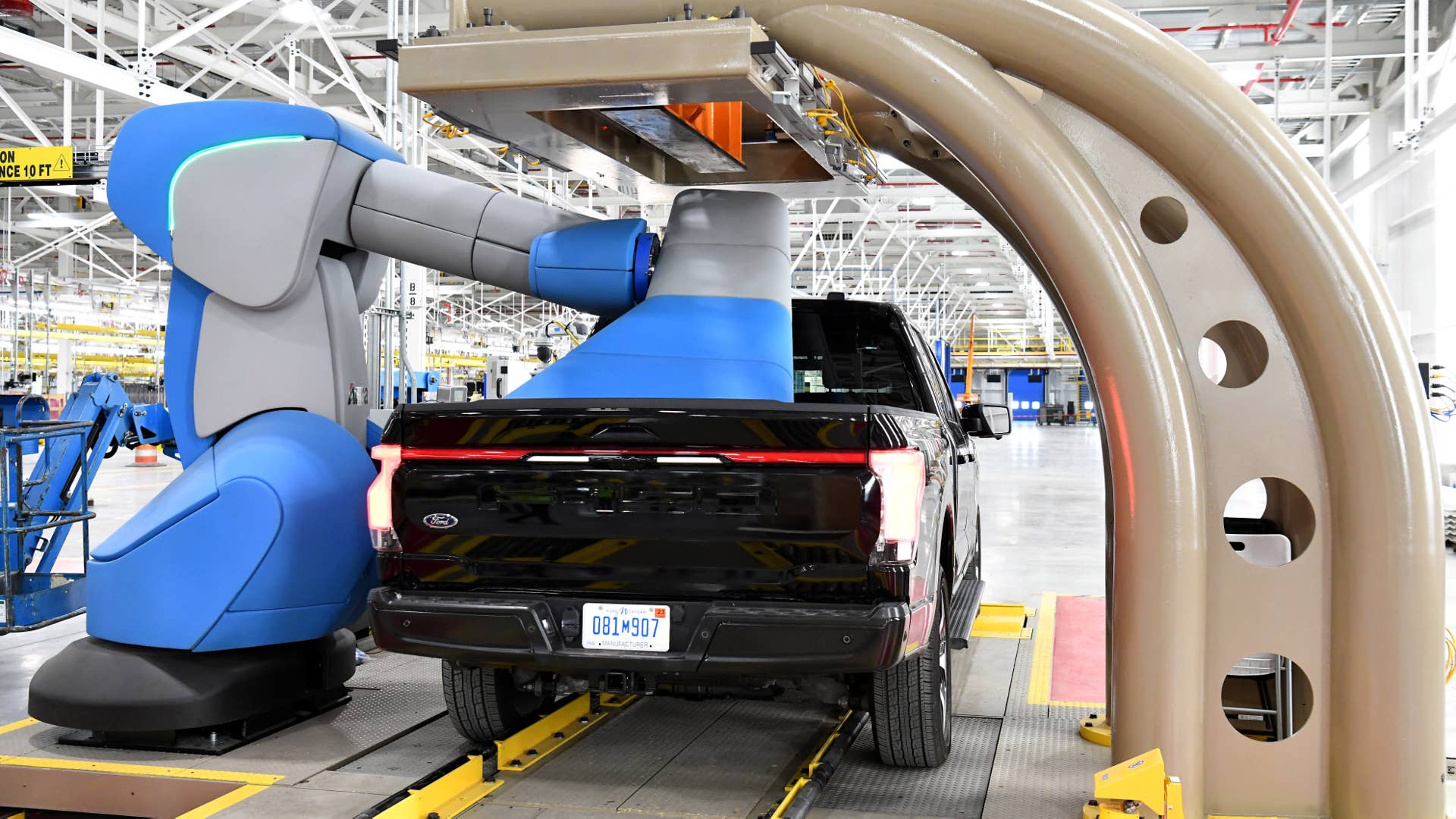 One year after Ford confirmed construction of the Rouge Electric Vehicle Center in Dearborn, Mich., the first Ford F-150 Lightning pre-production units begin leaving the factory. Pre-production model shown. F-150 Lightning available starting spring 2022.