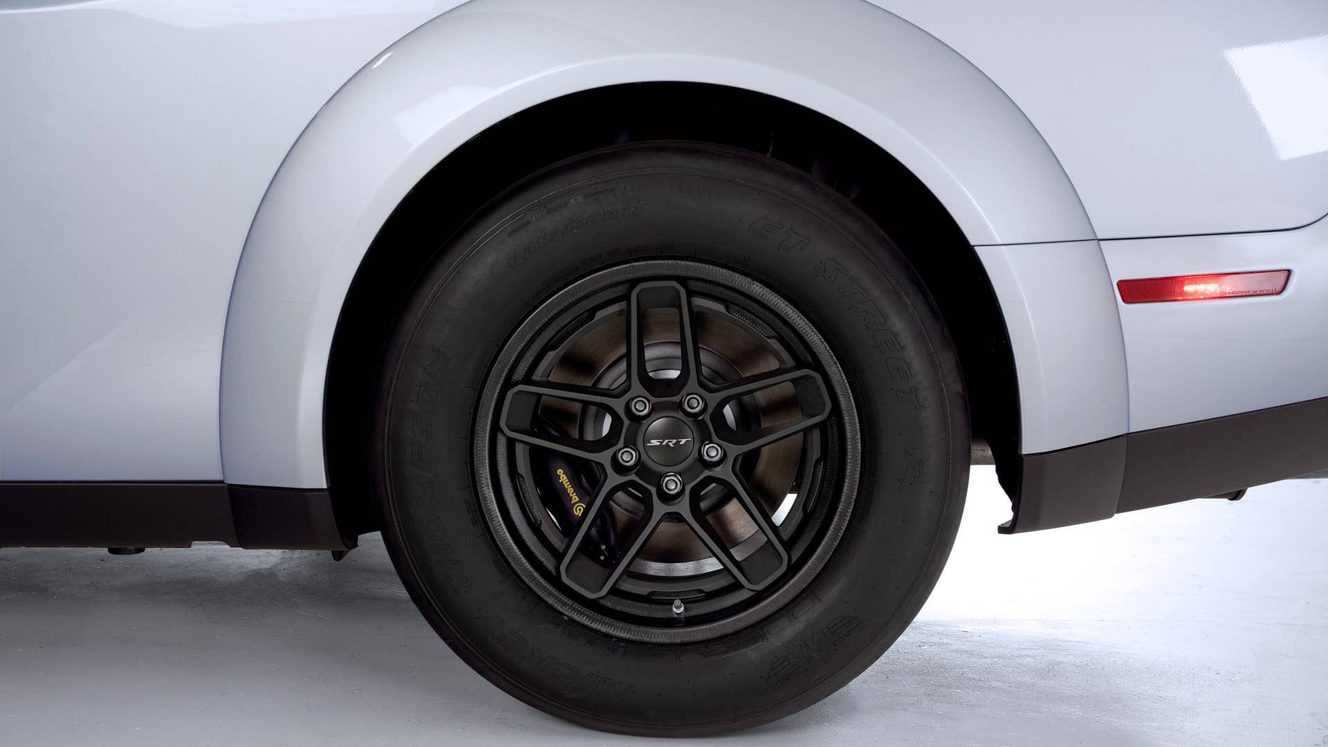 The optional Lacks Enterprises carbon fiber wheels shed weight from the 2023 Dodge Challenger SRT Demon 170.