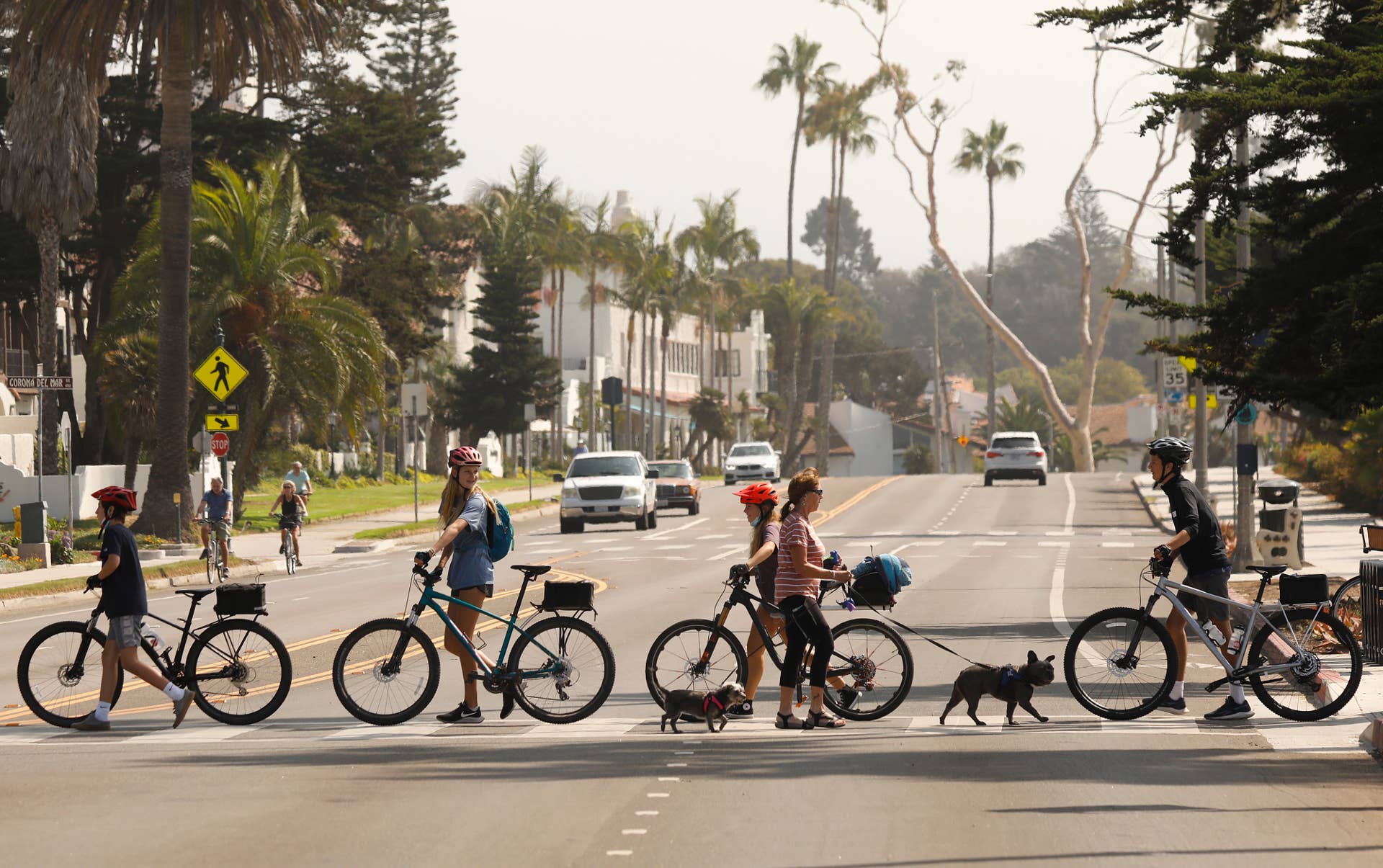 SANTA BARBARA, CA - SEPTEMBER 02: Busy crosswalk across East Cabrillo Blvd as students from Santa Barbara Middle School peddle their way along Santa Barbara Beach on Thursday, September 2, 2021 for a orientation ride according to an instructor as the long Labor Day weekend approaches. Temperatures are predicted to climb so scores of people may be headed to the beach.n Santa Barbara Beach on Thursday, Sept. 2, 2021 in Santa Barbara, CA. (Al Seib / Los Angeles Times via Getty Images).