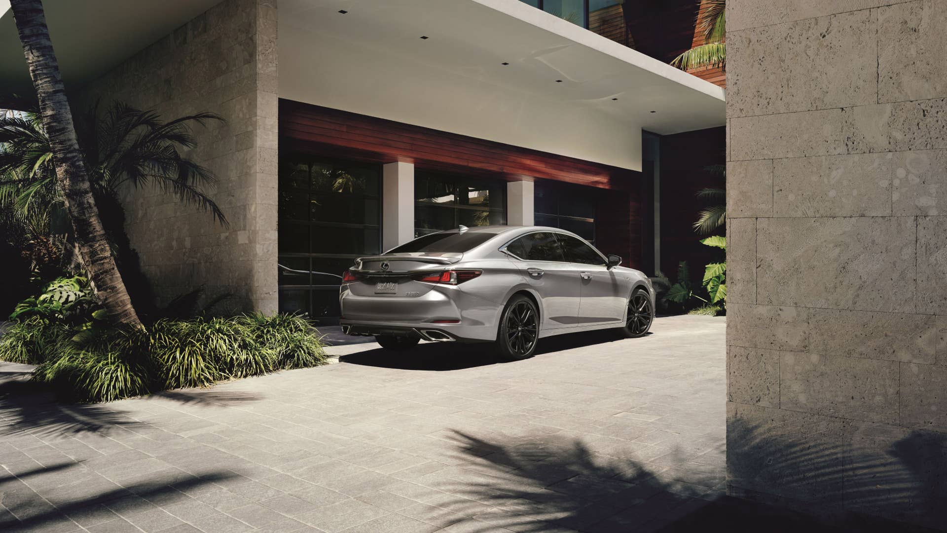2025 Lexus ES in silver rear angled view