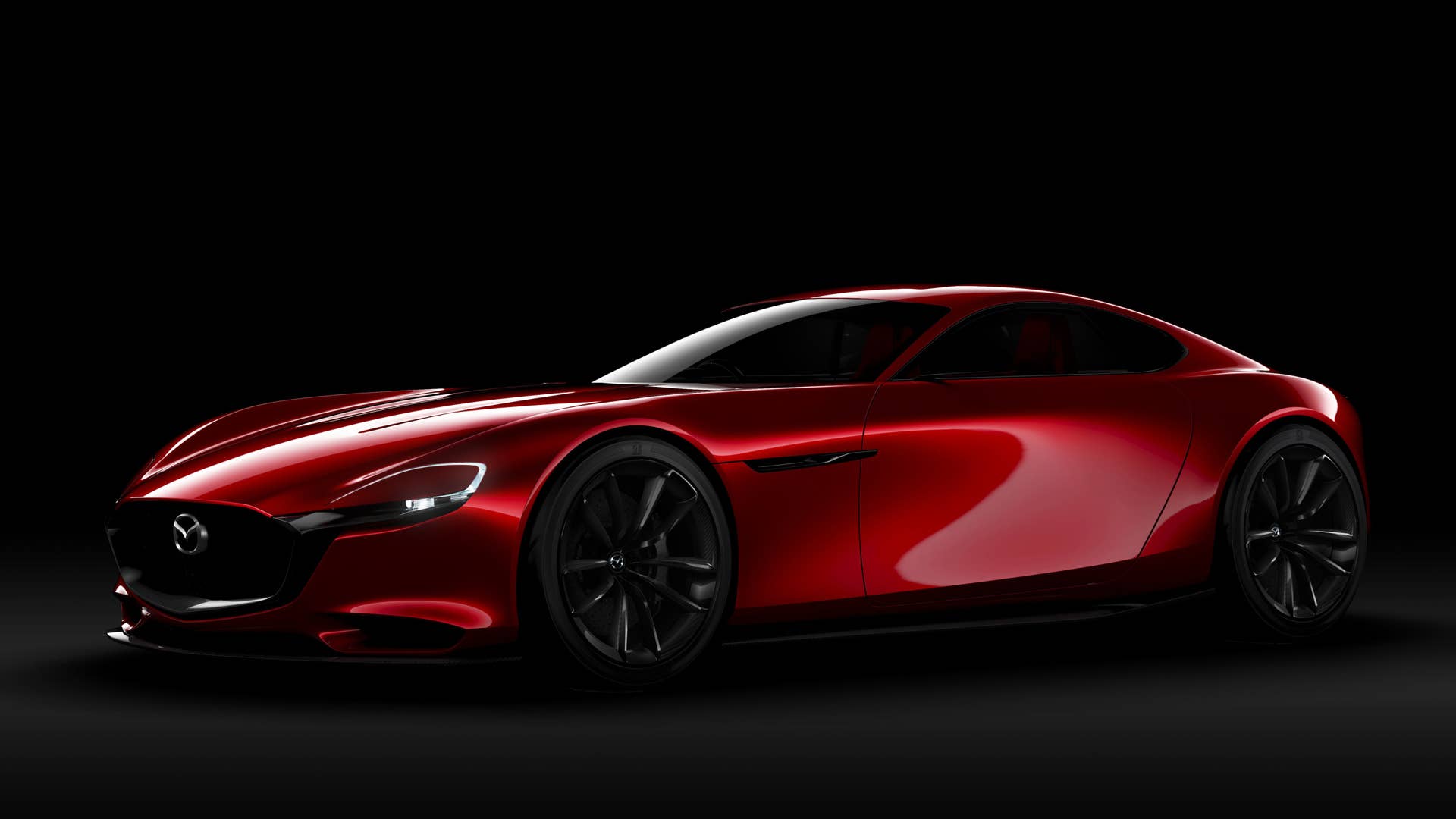 red mazda rx-vision concept black background