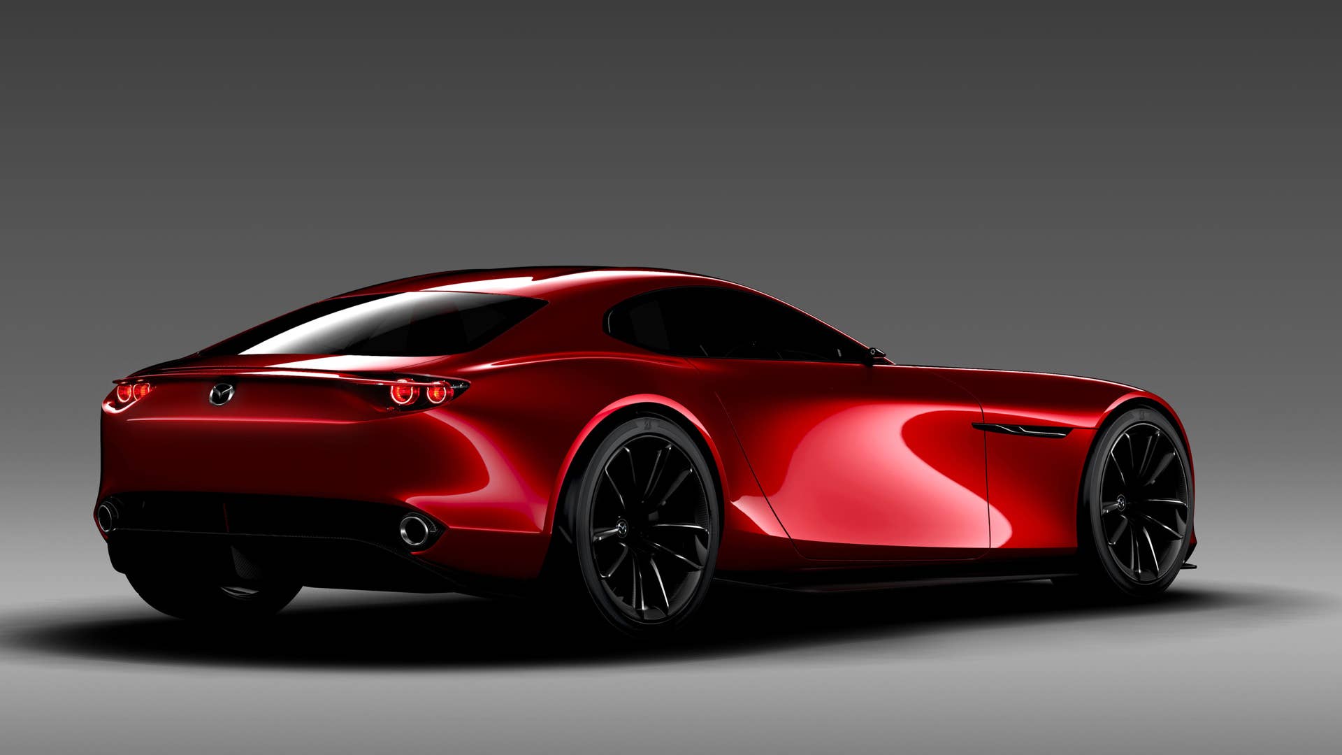red mazda rx-vision concept rear three quarters gray background