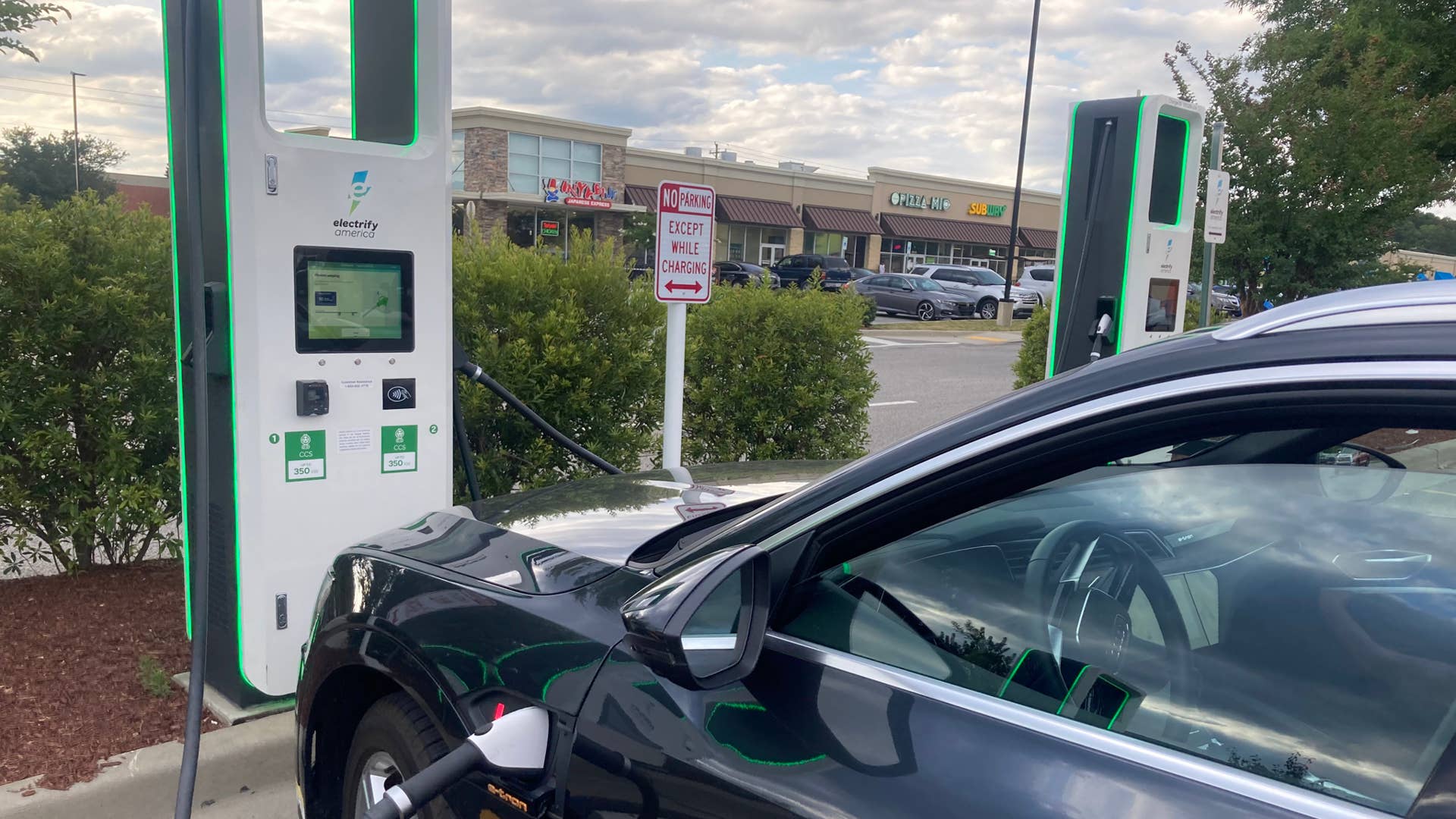 Florence, SC, USA - July 1 2001: Audi Etron Electric SUV At Electrify America Fast Charging Station Walmart