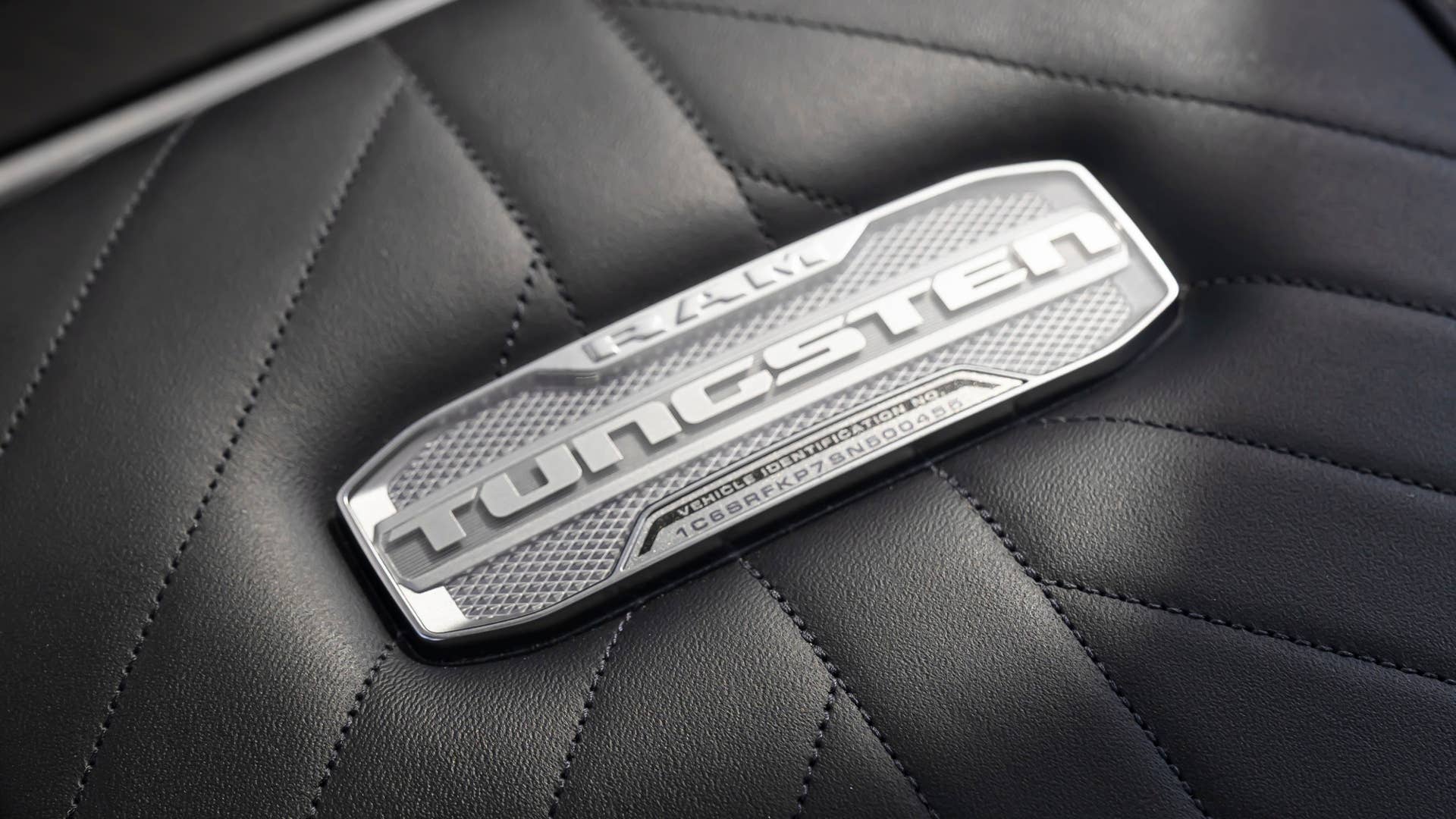 2025 Ram 1500 Tungsten center console badge