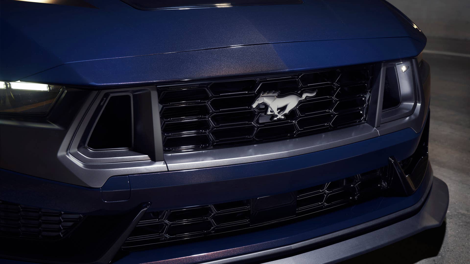 With sinister looks and a specially modified 5.0-liter V8 – the most powerful 5.0-liter V8 ever, projecting 500 horsepower – Dark Horse expands the Mustang lineup and sets a new benchmark for American street and track performance that could only come in a Mustang. Pre-production vehicles shown.