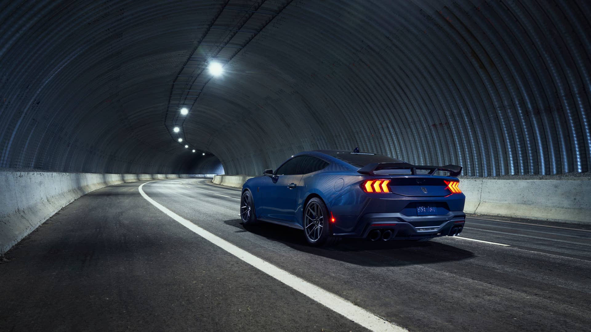 With sinister looks and a specially modified 5.0-liter V8 – the most powerful 5.0-liter V8 ever, projecting 500 horsepower – Dark Horse expands the Mustang lineup and sets a new benchmark for American street and track performance that could only come in a Mustang. Pre-production vehicles shown.