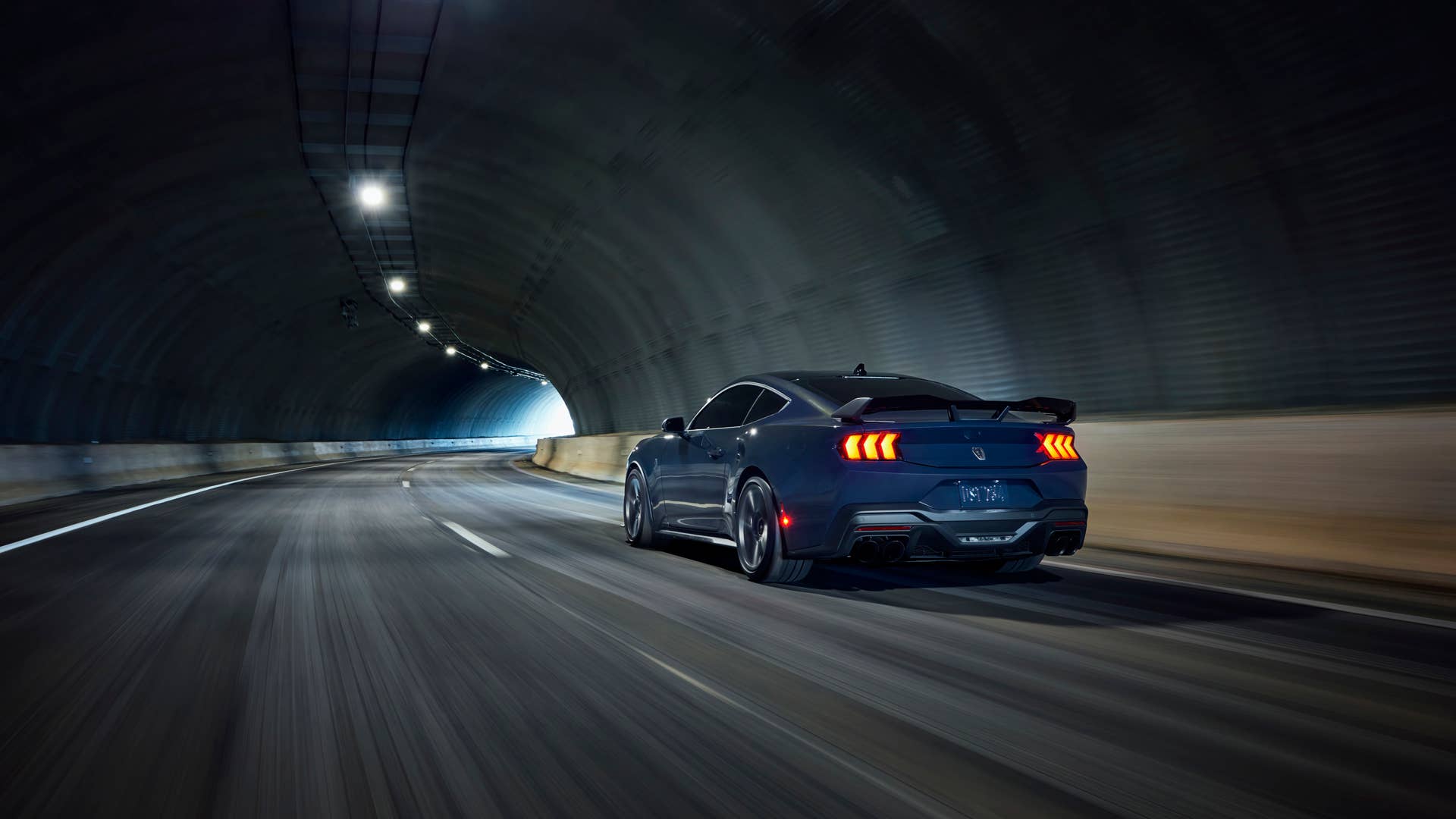 With sinister looks and a specially modified 5.0-liter V8 – the most powerful 5.0-liter V8 ever, projecting 500 horsepower – Dark Horse expands the Mustang lineup and sets a new benchmark for American street and track performance that could only come in a Mustang. Pre-production vehicles shown. Closed course. Professional driver.