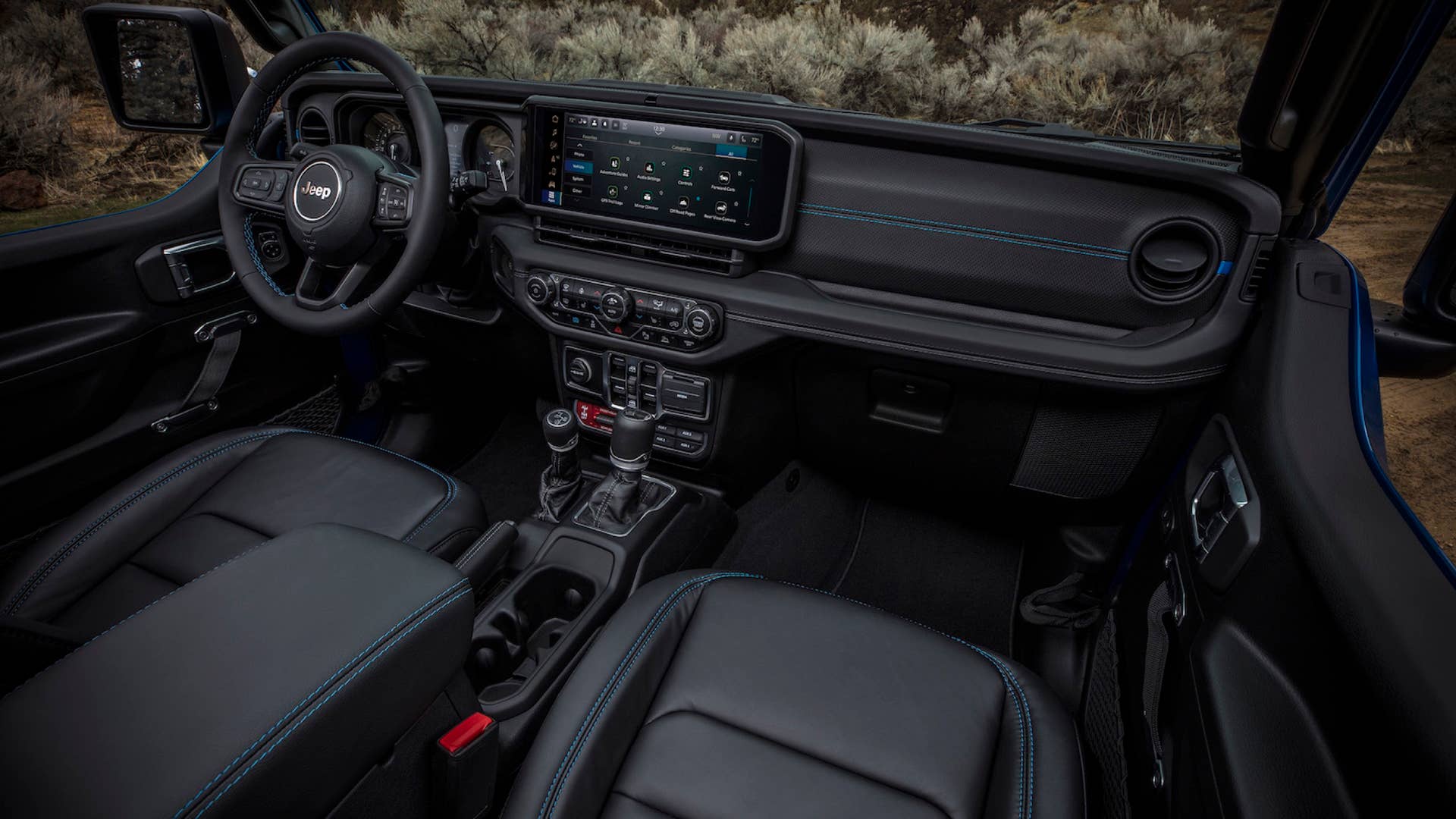 New 2024 Jeep® Wrangler Rubicon X 4xe with 12-way power adjustable front seats and all-new instrument panel featuring Uconnect 5 system with best-in-class 12.3-inch touchscreen radio