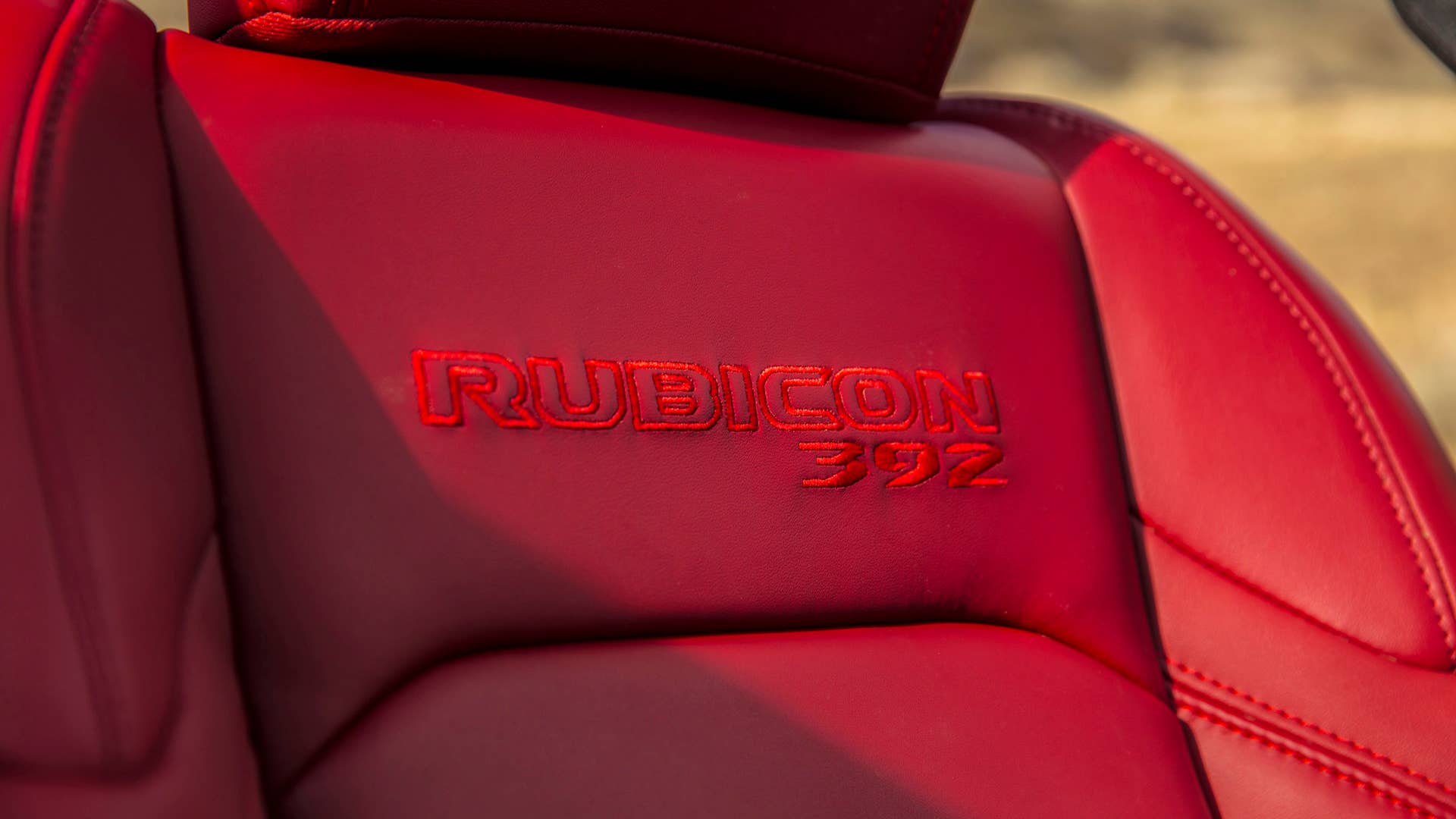 New 2024 Jeep® Wrangler Rubicon 392 with standard 12-way power adjustable Rubicon Red leather seats